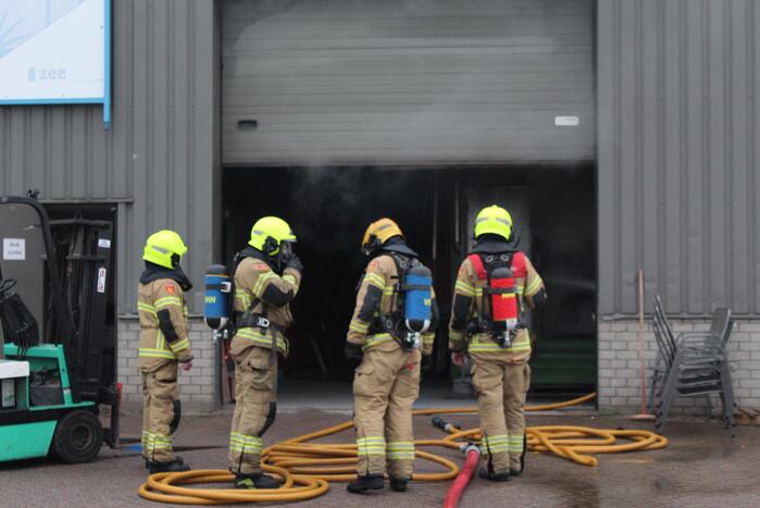 Veel rookontwikkeling na brand in machine
