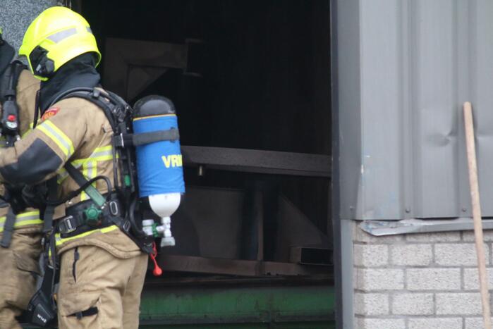 Veel rookontwikkeling na brand in machine