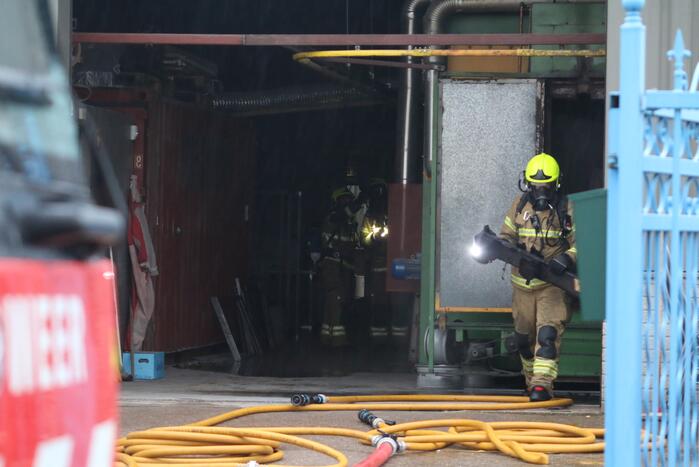 Veel rookontwikkeling na brand in machine