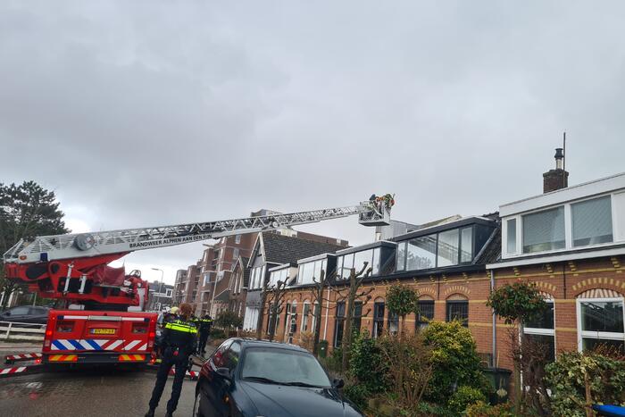Brand in schoorsteen van woning