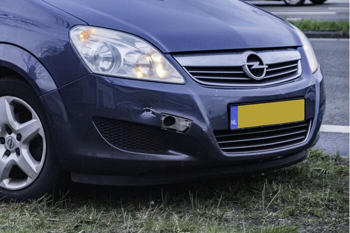 Maaltijdbezorger gewond bij botsing met personenauto