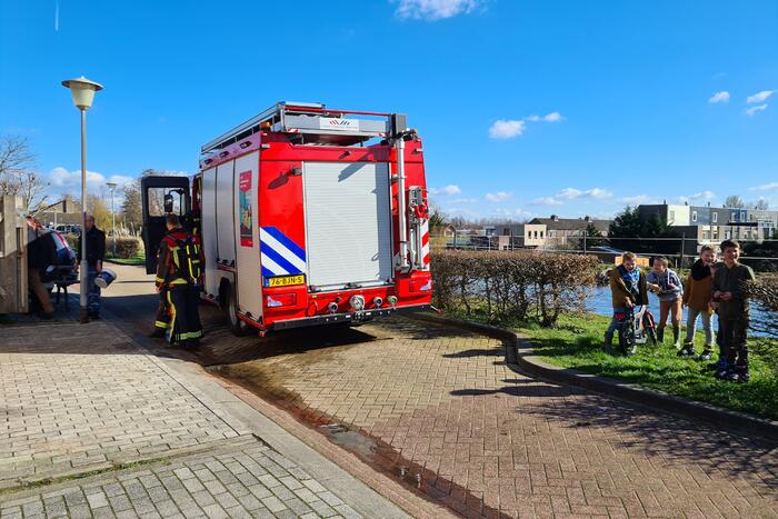 Smeulende barbecue zorgt voor brand