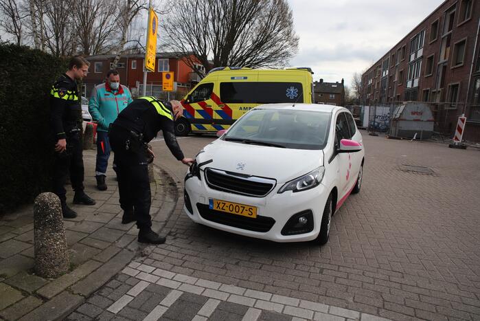 Schade bij aanrijding tussen twee auto's