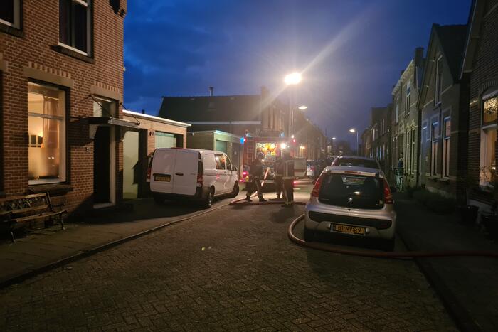 Veel rook door schoorsteenbrand