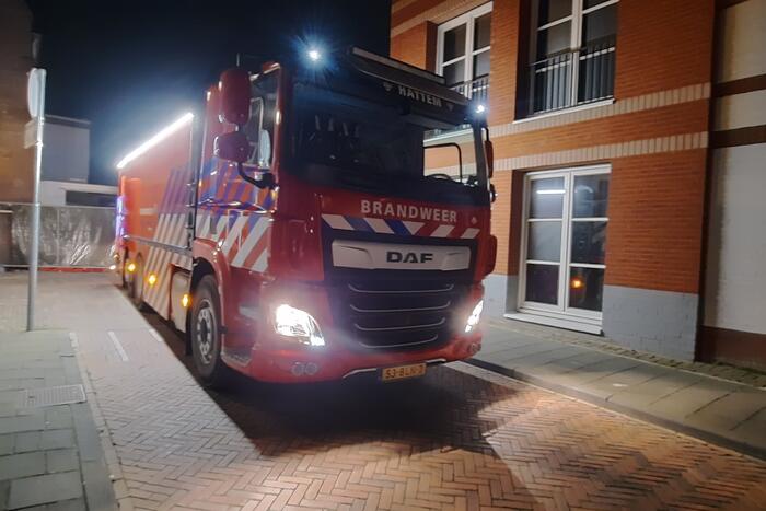 Meerdere appartementen ontruimd door brand, twee personen aangehouden