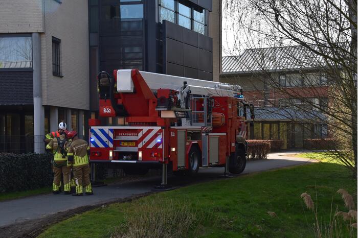 Glazenwasser vast in op hol geslagen lift