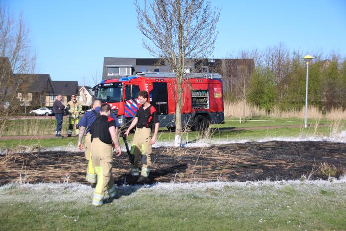 Stuk veld beschadigd door brand