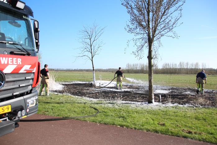 Stuk veld beschadigd door brand