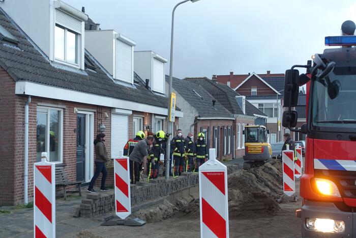 Stoeptegels gevallen op leiding