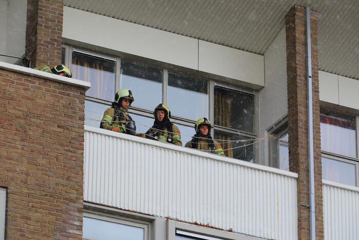 Verdieping flatgebouw ontruimd door brand