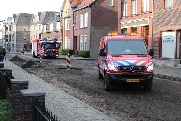 Brandweer blust schoorsteenbrand