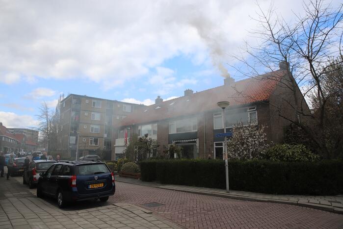 Veel rook bij brand in schoorsteen