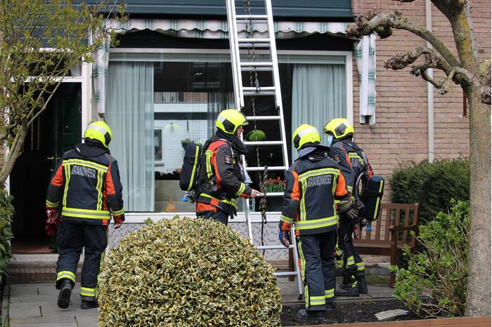 Veel rook bij brand in schoorsteen