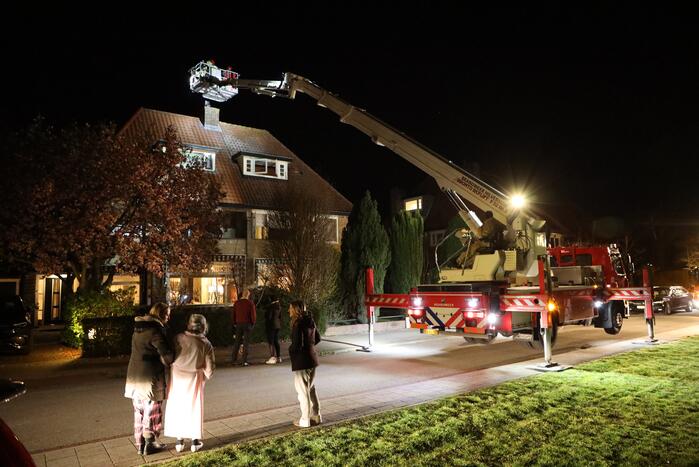 Veel rook door schoorsteenbrand