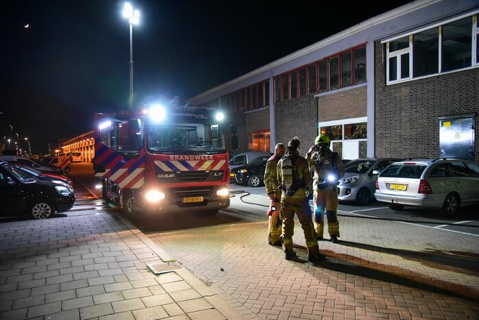 Brand in portiek van woning