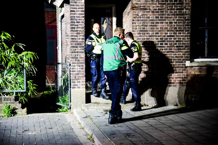 Brand in portiek van woning