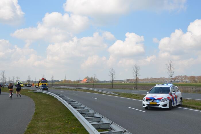 Mini Cooper total-loss na botsing tegen vangrail