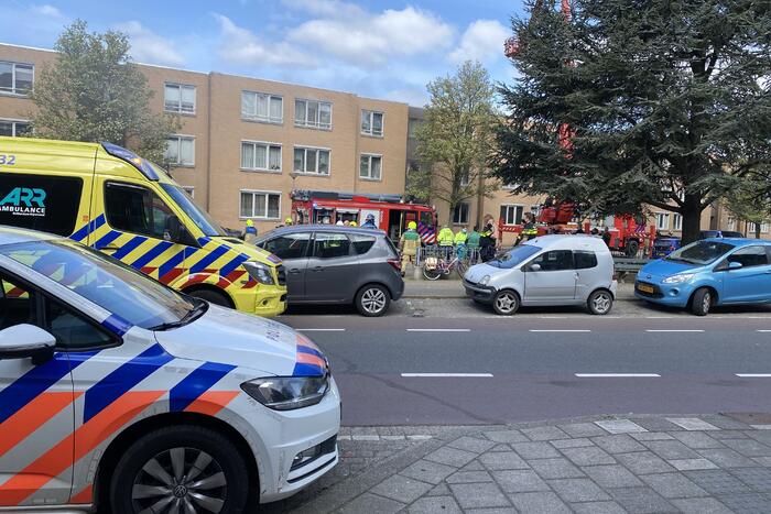 Meerdere bewoners door brand opgesloten in woningen