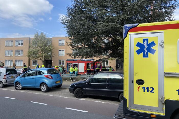 Meerdere bewoners door brand opgesloten in woningen