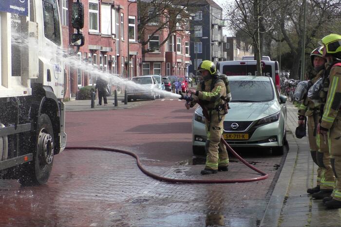 Lading van vuilniswagen vat vlam