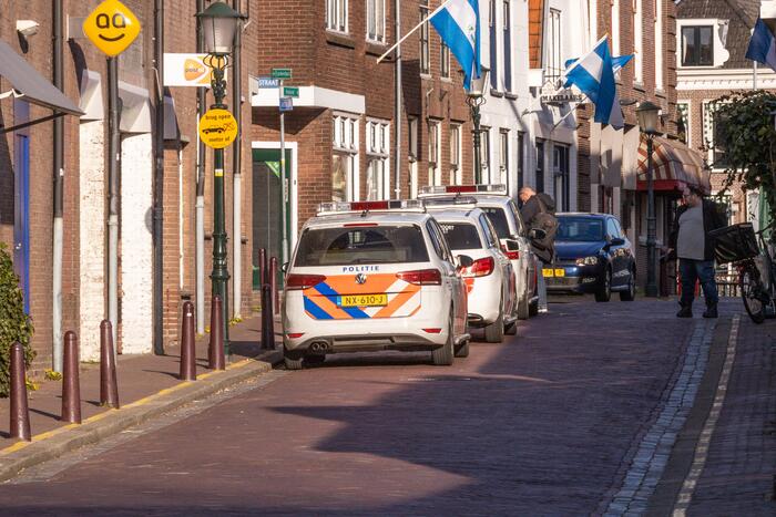 Man met bivakmuts lost schoten