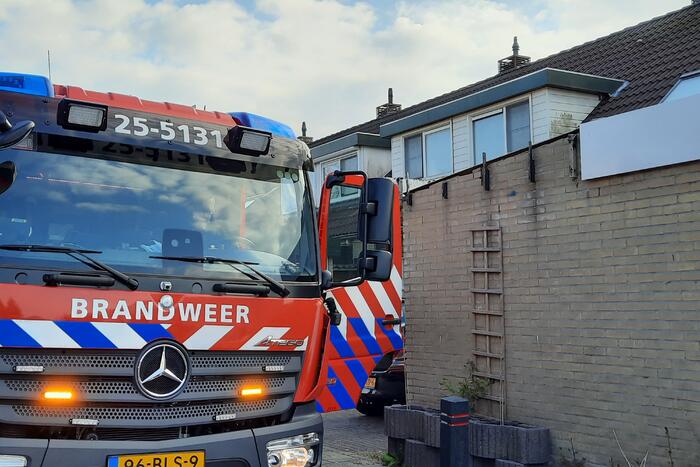 Brand in schoorsteen van woning