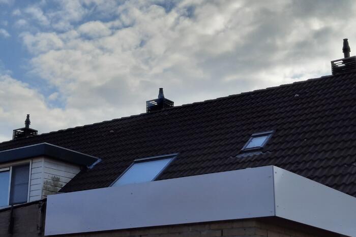 Brand in schoorsteen van woning