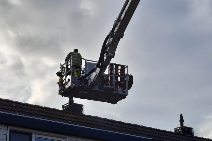 Brand in schoorsteen van woning
