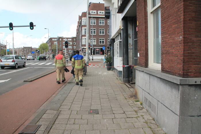 Afzetting door betonbrokken van balkon