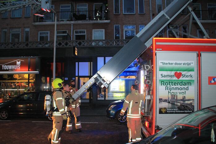 Uitslaande brand in portiekwoning