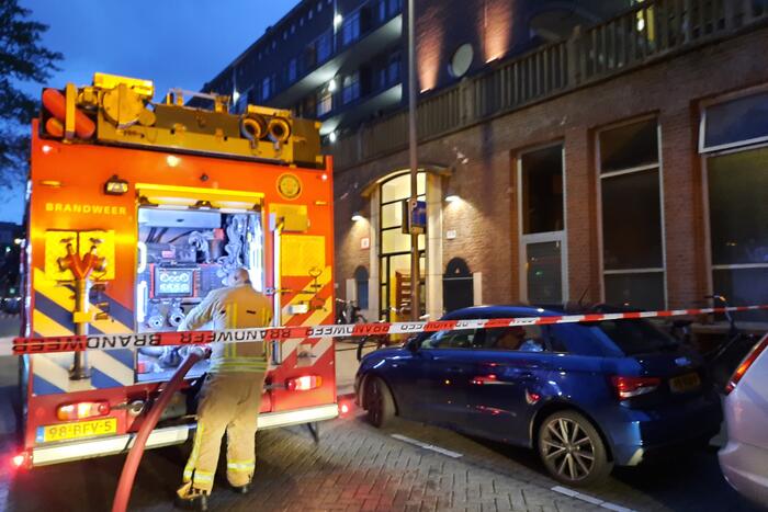 Uitslaande brand in portiekwoning
