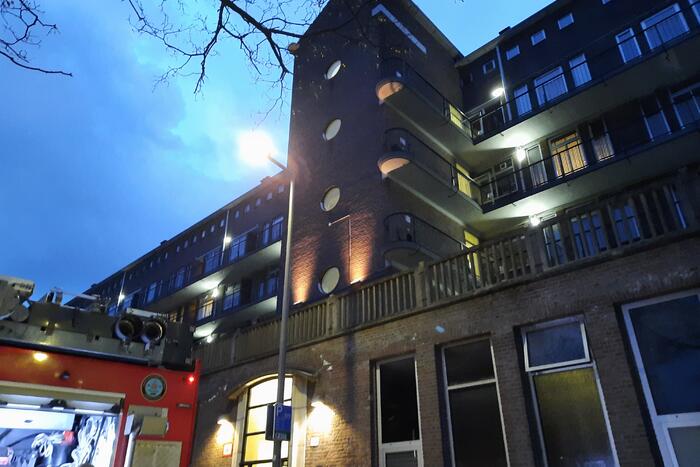 Uitslaande brand in portiekwoning