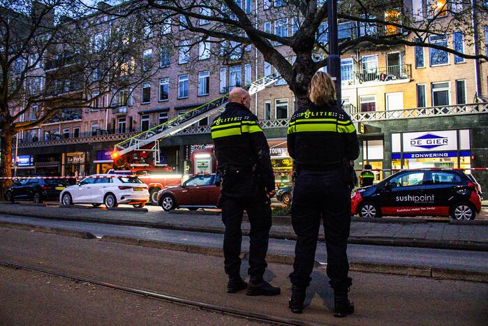 Uitslaande brand in portiekwoning