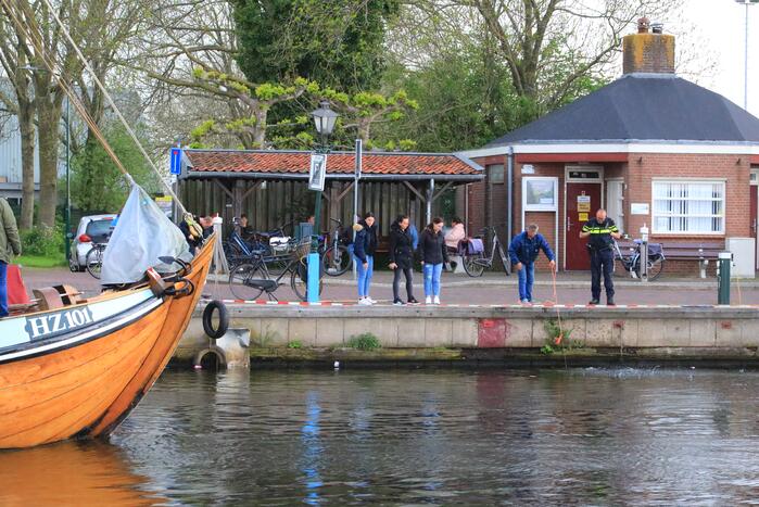 Scooter raakt te water bij ligplaats van watertaxi
