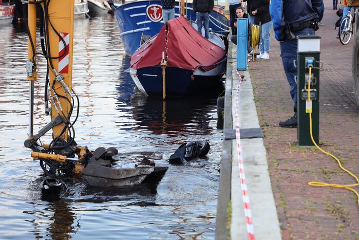 Scooter raakt te water bij ligplaats van watertaxi
