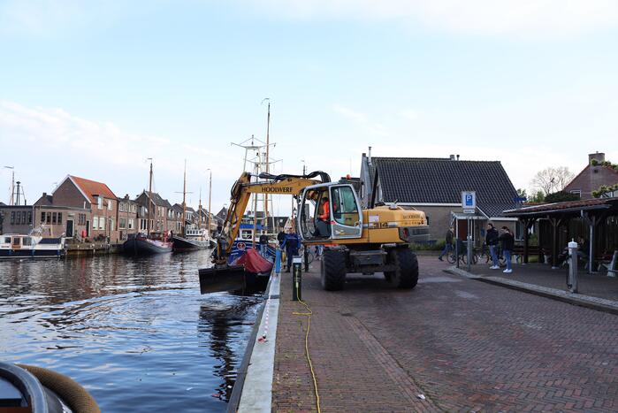 Scooter raakt te water bij ligplaats van watertaxi