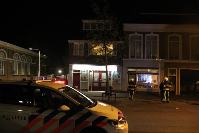 Brandende bakplaat in snackbar veroorzaakt schade