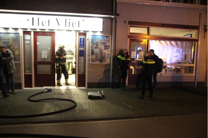 Brandende bakplaat in snackbar veroorzaakt schade