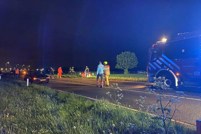 Auto te water, meerdere gewonden