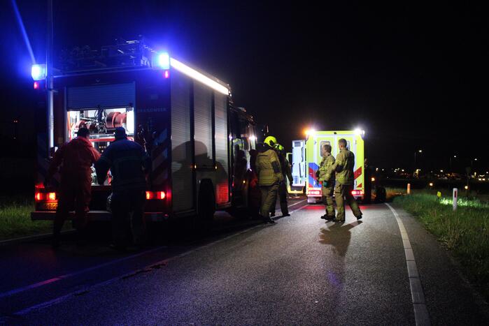 Auto te water, meerdere gewonden