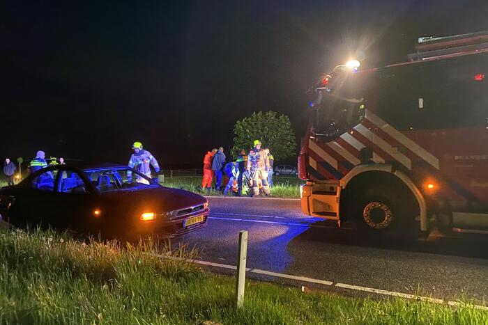 Auto te water, meerdere gewonden