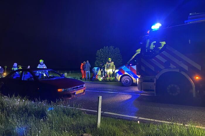 Auto te water, meerdere gewonden