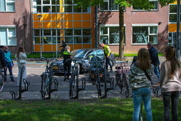 Motorrijder gewond door botsing tegen personenauto