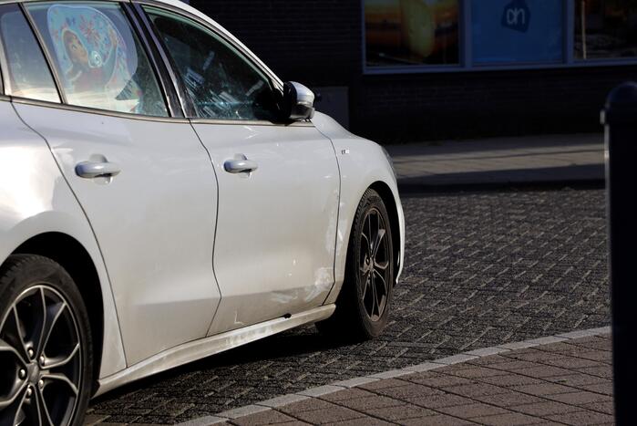 Botsing tussen personenauto en scooter