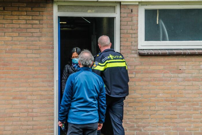 Brand in kelderbox van portiekwoning