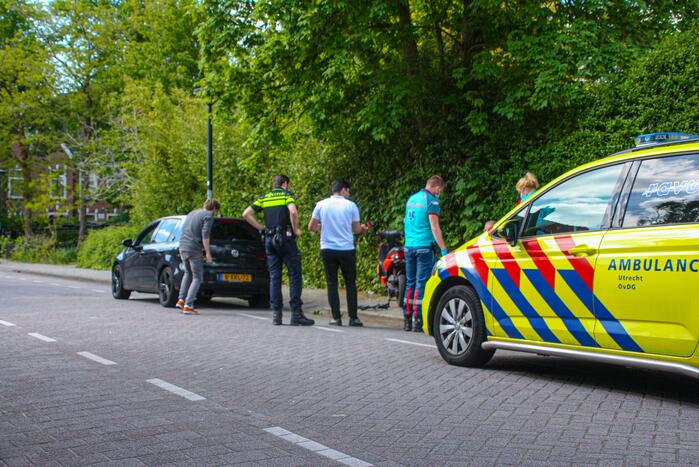 Schade na botsing tussen scooter en auto