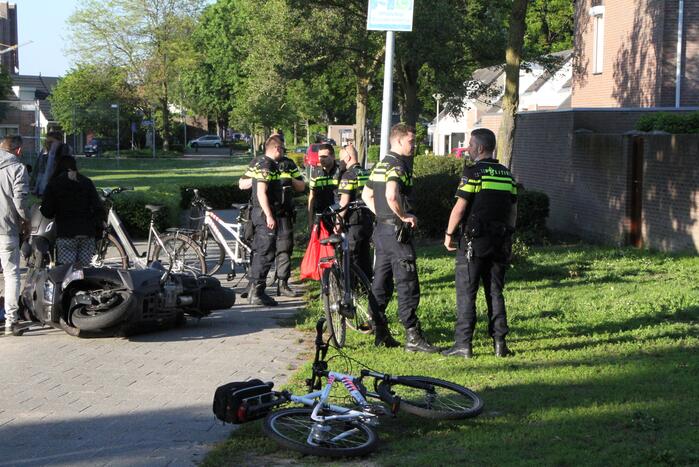 Persoon gewond na val met motorscooter