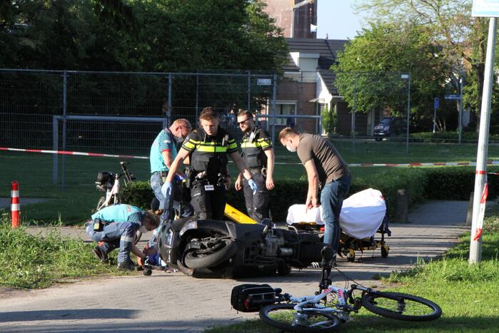 Persoon gewond na val met motorscooter