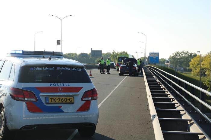 Schade bij ongeval tussen drie voertuigen