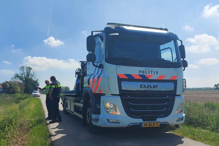 Bestuurder driewieler belandt in sloot